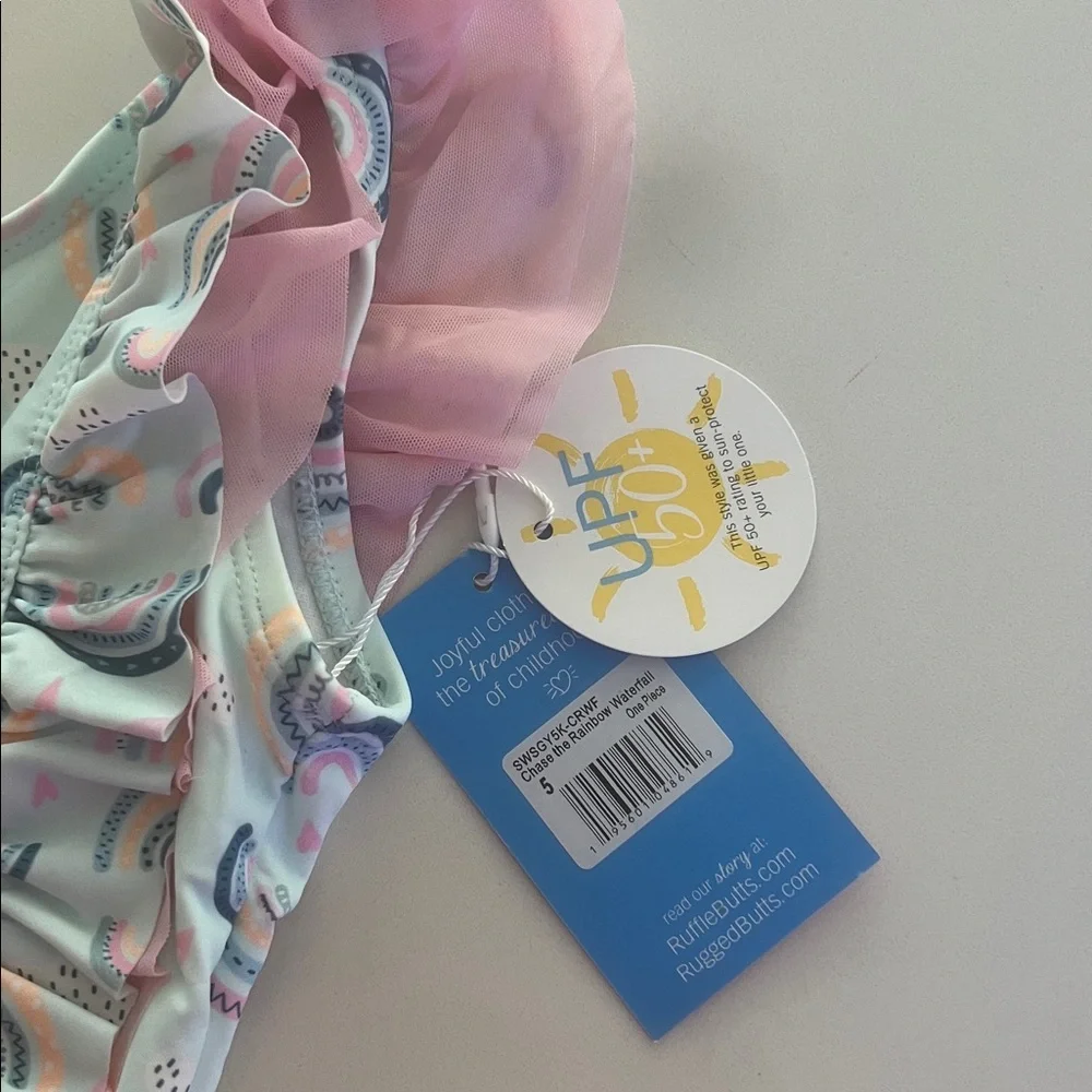 NWT RuffleButts Chase The Rainbow Waterfall Girls One Piece Swimsuit- back bow